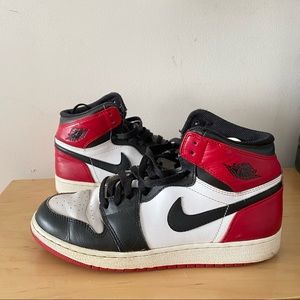 red and black air jordan 1s